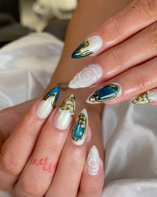 White, teal and gold statement manicure